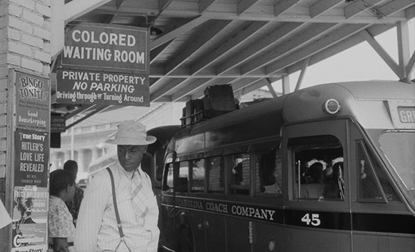 FSA photographer Jack Delano captured the signs of segregation at this bus station in Durham, North Carolina in 1940. Via the Library of Congress.