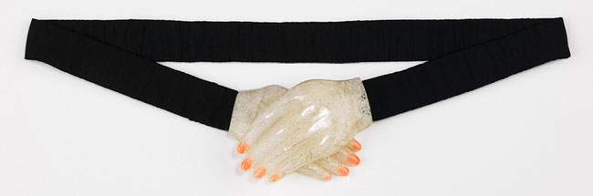 A Schiaparelli belt with a hand-shaped clasp from 1934. Courtesy the Metropolitan Museum of Art.