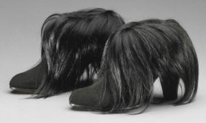 Schiaparelli topped these suede boots with monkey fur in 1938. Courtesy the Philadelphia Museum of Art.