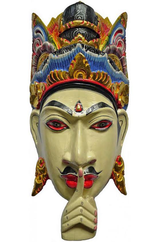 The DND sign for Puri Kamandalu Resort & Spa in Bali, Indonesia, is a hand-carved and hand-painted deity. (Courtesy of Edoardo Flores)