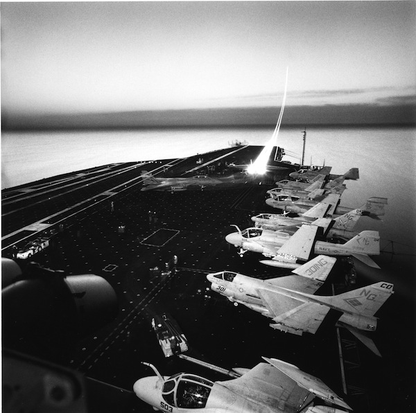 Time-exposure photograph of a Grumann F-14 taking off from the deck of the USS Nimitz, off the coast of San Diego, 1988.