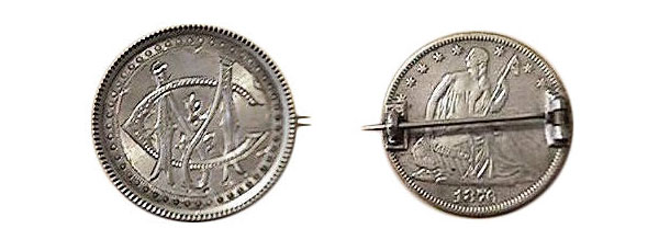 This 1876 half dollar was carved with the initials "MC" and made into a pinback. (Courtesy of the Love Token Society)