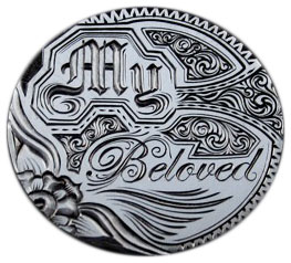 Current-day artist Andy Gonzales engraved this "My Beloved" design on a 1900 Liberty nickel. (Courtesy of the Love Token Society)