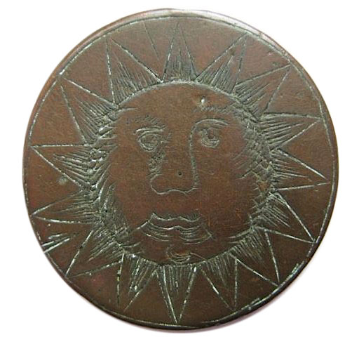 This early love token features a sun engraved with scrimshaw technique on an English half penny. (Courtesy of the Love Token Society)