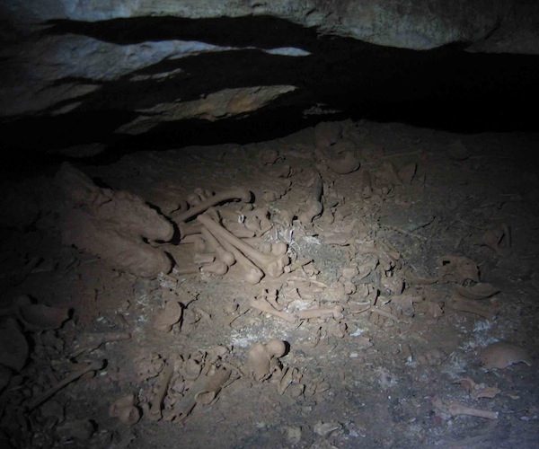 This deposit of human remains in Midnight Terror Cave is located in a low muddy area called Bone Soup.