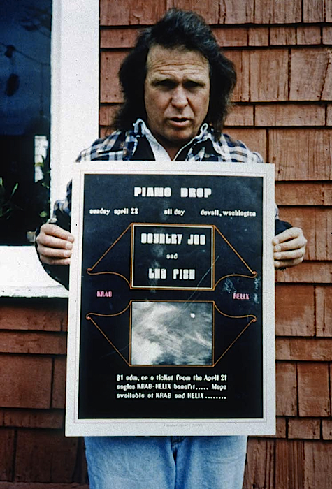 In the 1990s, Paul Dorpat gave Joe McDonald (above) a copy of a poster designed by Paul Heald and made to promote the Piano Drop.