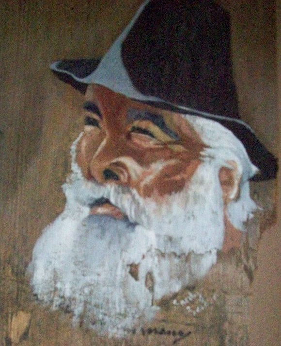 A driftwood painting of the famous late hobo Maurice "Steam Train Maury" Graham in the Hobo Museum. (Via the Hobo Museum's Facebook page)