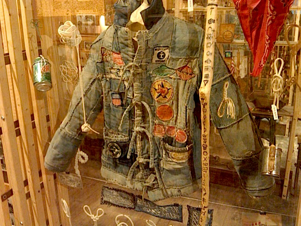The collection at the Hobo Museum includes hobo clothing, walking sticks, knots, and cups made out of cans. (Via the Hobo Museum)