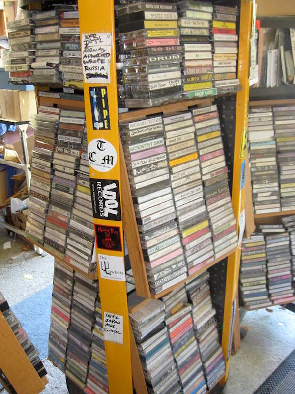 Don Campau keeps part of his cassette collection in wooden kiwi boxes stashed in battery displays that he got from his day job at Safeway. (Courtesy of Don Campau)