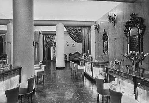 The interior of Helena Rubinstein's beauty salon at 715 Fifth Avenue, New York, in the early 1940s. (Via <a href="http://americanpast.blogspot.com/2014/07/the-beauty-of-miniature-helena.html">American Past</a>)