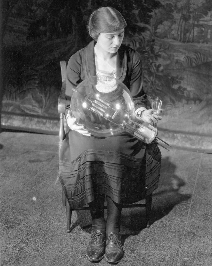 Actress Maude Adams worked with General Electric to develop improved lighting for theaters and movie sets, culminating in the creation of the world's largest incandescent bulb, at 30,000 watts, which she compares with a standard 25-watt bulb, circa 1921.