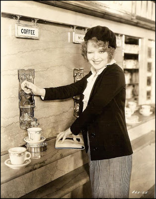 Actress Clara Bow fills her cup at a Horn & Hardart in a promotional still for the 1931 film "No Limit."