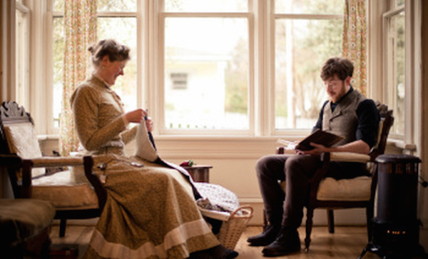 Gabriel reads out loud to Sarah while she sews in the evening light from their window. (Photo courtesy Estar Hyo-Gyung Choi, Mary Studio, via ThisVictorianLife.com)