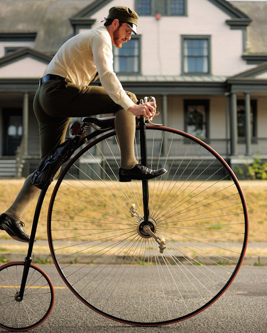 Gabriel mounts his high-wheel bicycle. (Photo courtesy Estar Hyo-Gyung Choi, Mary Studio, via ThisVictorianLife.com)