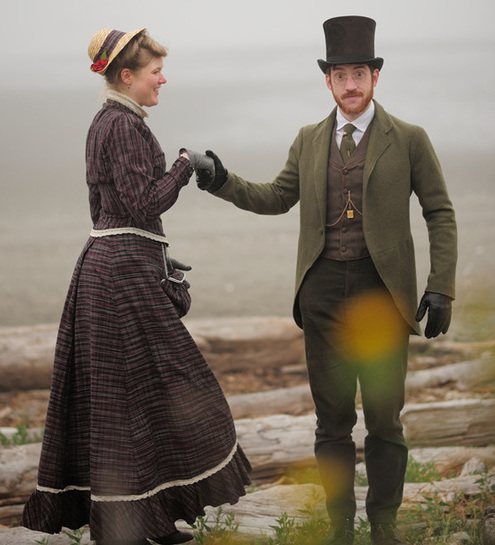 Sarah wears an 1880s style dress in a reproduction of a popular 1880s plaid. Gabriel's pants and waistcoat were copied from an 1870s suit while his cutaway coat was copied from an 1889 original. He wears an antique beaver-felt top hat. (Photo courtesy Estar Hyo-Gyung Choi, Mary Studio, via ThisVictorianLife.com)
