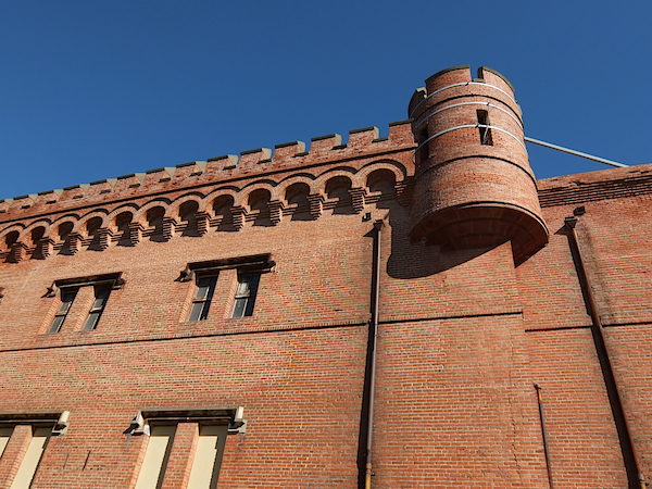 View of Building One at Winehaven today. Note the braces holding the brick turret in place.