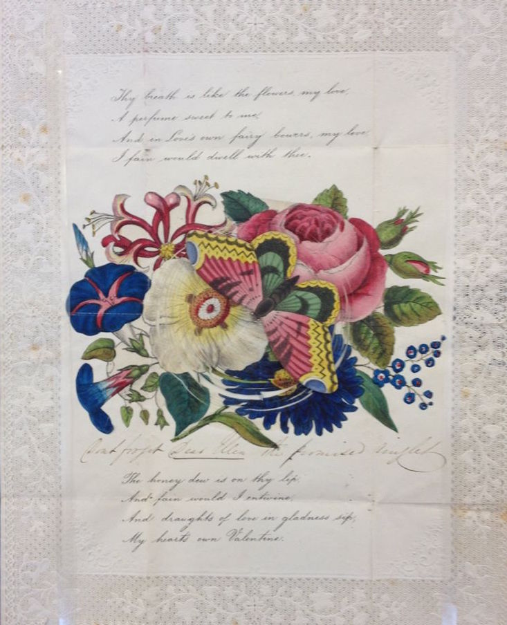 Papercut "cobweb" Valentines contain a secret image or message under the surface. Below, see the image that's revealed when you pull on the butterfly. (From the John Johnson Collection at the Bodleian Library, University of Oxford)