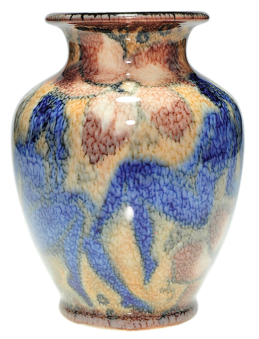 This 6 1/2-inch tall vase featuring blue nudes was designed by Rookwood ceramist Jens Jensen in 1933. (Via Mark Mussio, Humler & Nolan)