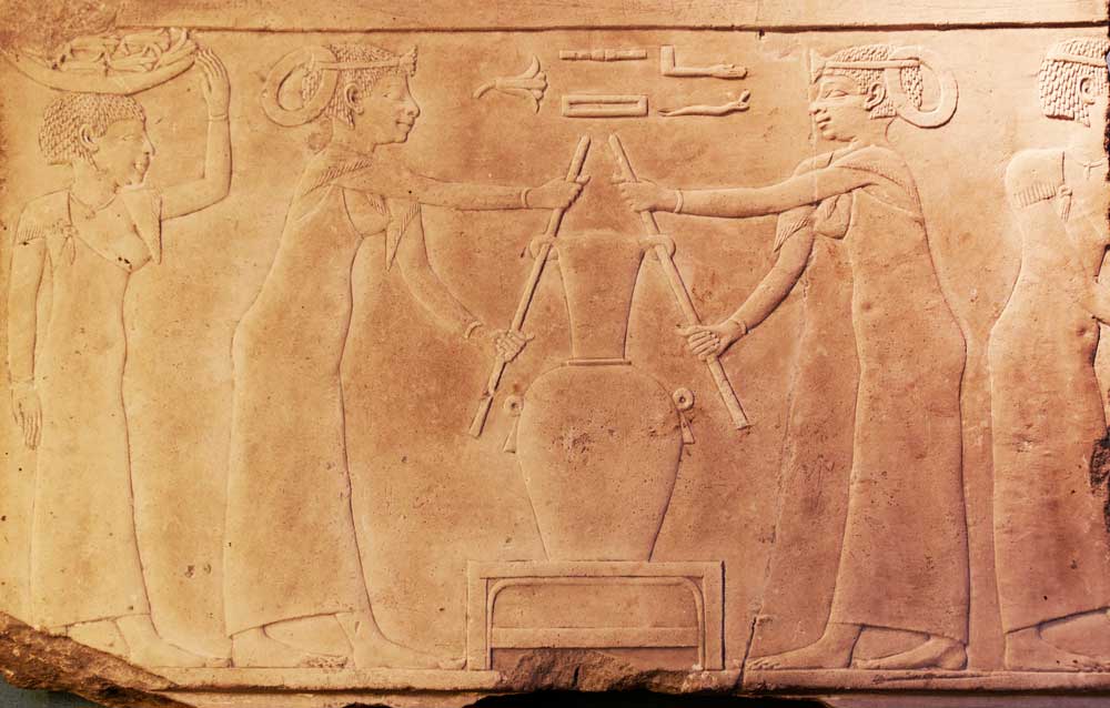 Top: A Mum deodorant advertisement from the 1920s captures the rise of the modern deodorized era. Above: This Egyptian relief carving in a tomb illustrates the making of lily perfume, circa 2500 B.C.