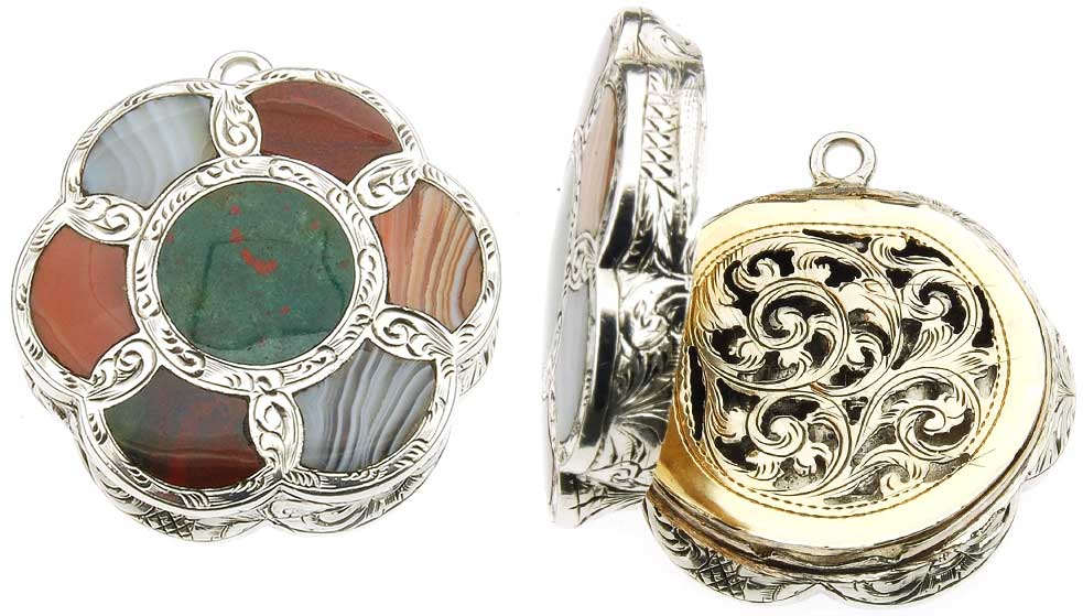 An agate-topped silver vinaigrette with an engraved interior grill, circa 1857.
