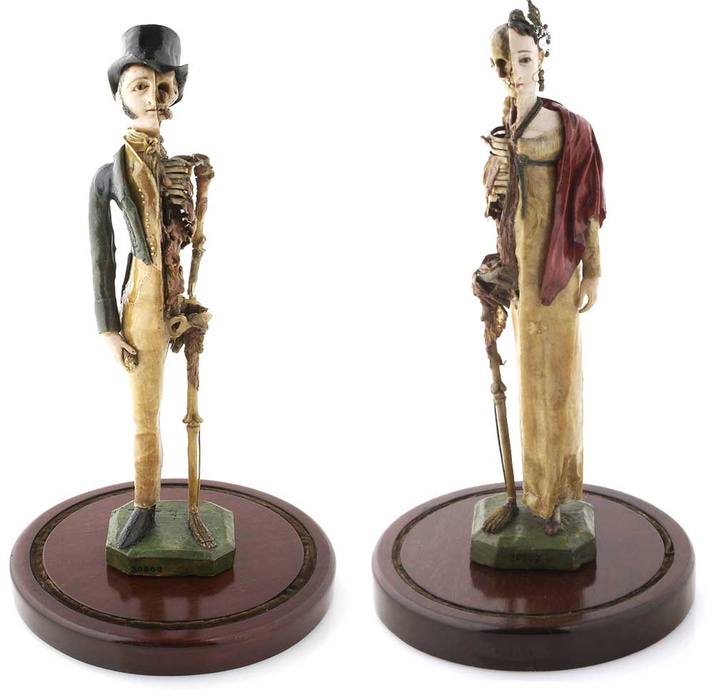 Two miniature wax models depicting a couple—each half fashionable youth, half skeleton—as a form of memento mori, circa early 19th century. Courtesy the Wellcome Library, London.