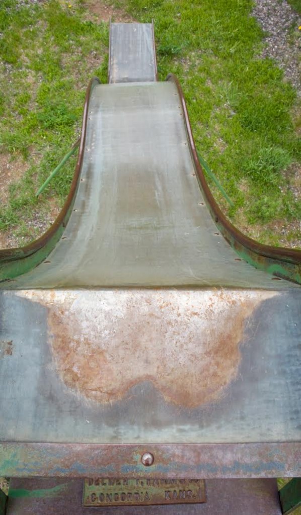 This 1930s-era slide, found in Sargents, Colorado, in 2007, developed a butt-shaped imprint. (Photo by Brenda Biondo)
