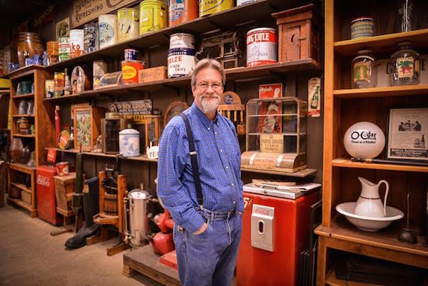 Cracker Barrel décor manager Larry Singleton stands inside the company's antiquse warehouse in Lebanon, Tennessee. (Courtesy of Cracker Barrel Old Country Store)
