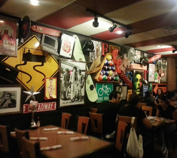 In 2013, the walls of a Los Angeles Friday's were covered in layers and layers of stuff. (Via Excellent Notion)