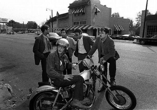 The founders of the Memphis Friday's in the 1970s: James D. Robinson Jr. sits on his motorcycle, and behind him are Ben H. Woodson, George Saig, Charles H. Hull, and Frank E. Doggrell III. (Via OvertonSquare.com)