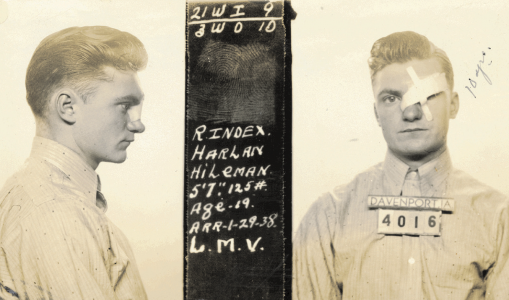 This mugshot from Davenport, Iowa, taken in 1938 captures a young man with a recent facial injury. Courtesy of Mark Michaelson.