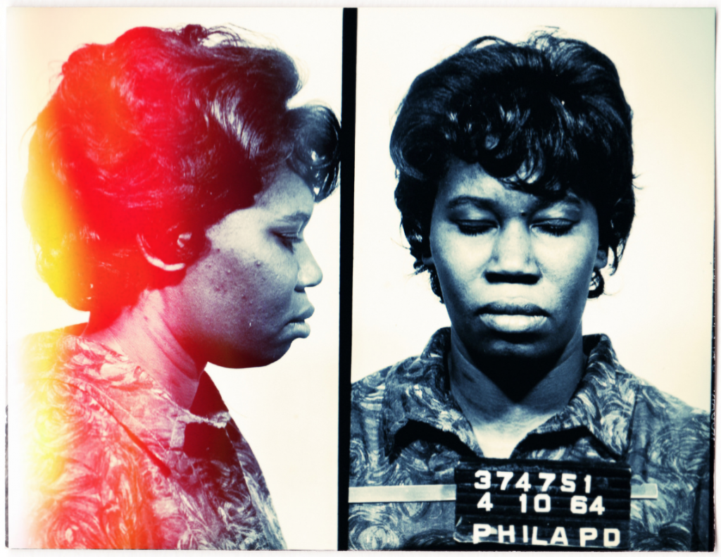 This 1964 arrest photo from Philadelphia captures the accidental beauty inherent to analog prints. Courtesy of Mark Michaelson.