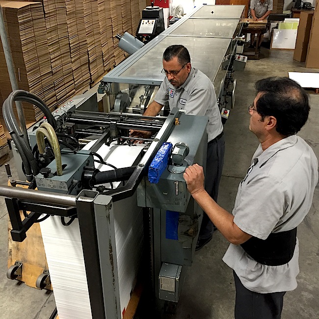 The "Winkler," as it's called, diecuts, folds, and glues direct-to-board jackets.