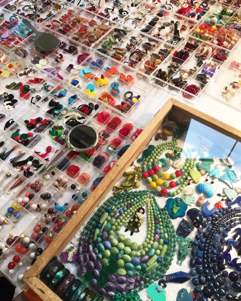 A tabletop display of colorful costume jewelry.