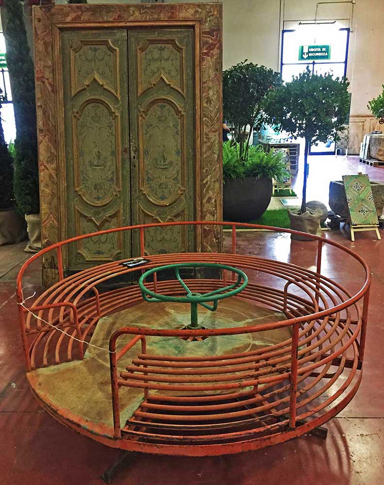The "Archi e Parchi" area includes oversized outdoor objects like this children's merry-go-round.