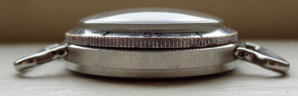 A profile view of the Vostok Amphibia 300m watch showing the extra-thick crystal.