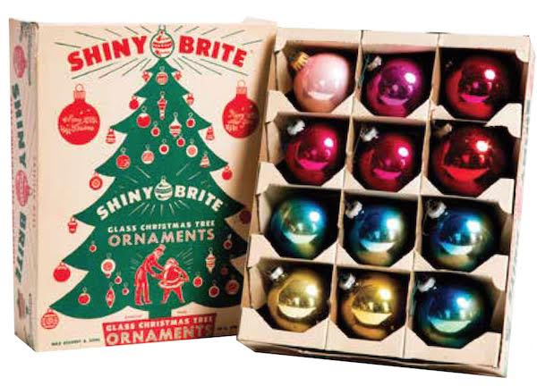 A dozen Shiny Brite ornaments, including some ombré ones, from the 1950s and 1960s, shown in a vintage box from the same period. Photo by Jeffrey Stockbridge. (From Mid-Century Christmas)