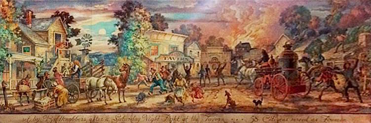 This mural in the waiting area of Fire in the Hole claims "Baldknobbers" burned down a town they never operated in, nearly a dozen years before the vigilante committee even formed. (Photo by Lisa Hix)
