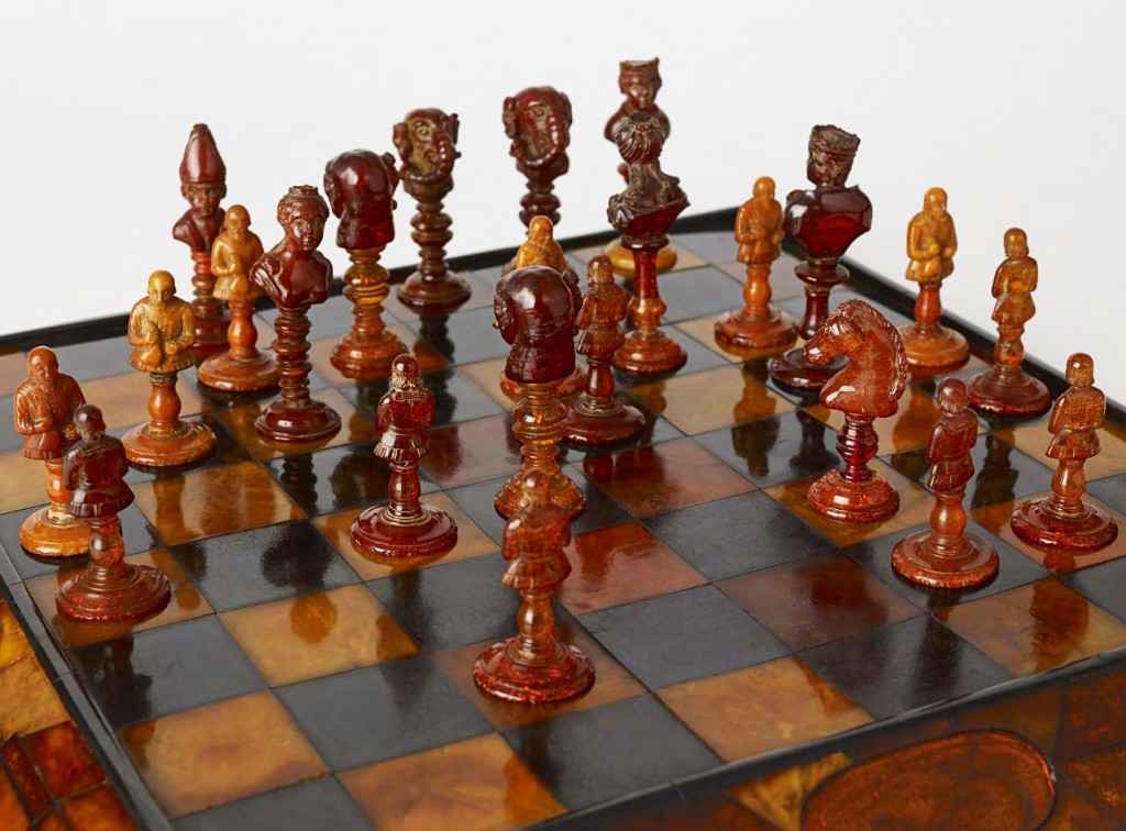 This chess set, featuring busts of Catherine the Great and her political counterparts, was carved from the amber mined in Kaliningrad, Russia, circa late 18th century. (Click to enlarge)