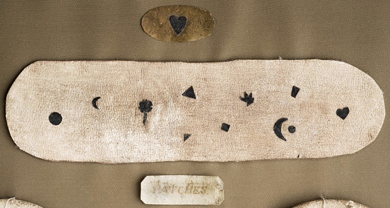 A selection of 18th-century fabric patches. Via the Wellcome Library, London.