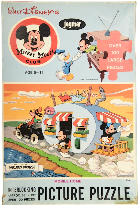 A 1960s Mickey Mouse Club puzzle portrays Mickey and friends vacationing with a "canned ham" style travel trailer. (From Don't Call Them Trailer Trash, courtesy of Schiffer Publishing)