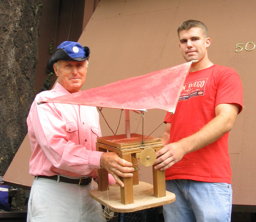 Nautical rigging expert Warwick "Commodore" Tompkins and Brandon Alinger hold the model Tompkins' built for Jabba the Hutt's sail barge. (Courtesy of Brandon Alinger)
